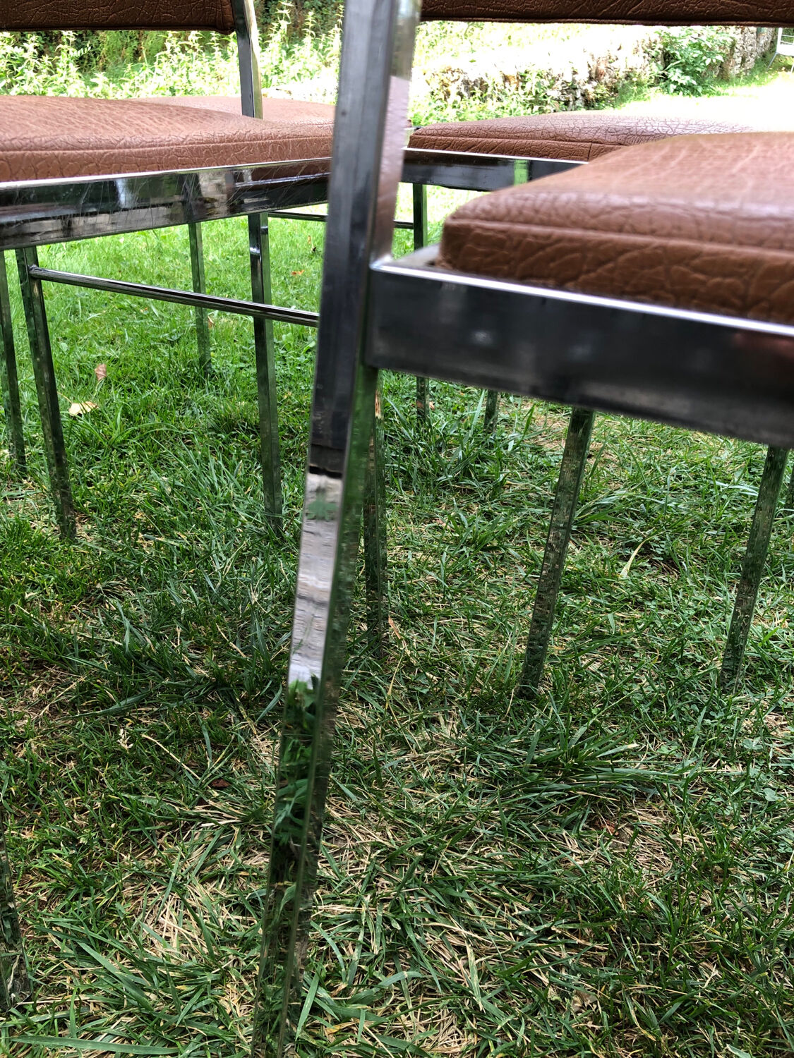 Skai and chrome chairs