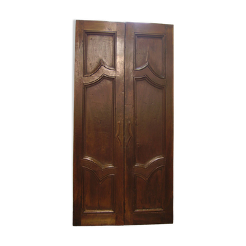 Pair of antique solid walnut doors from the 18th century.