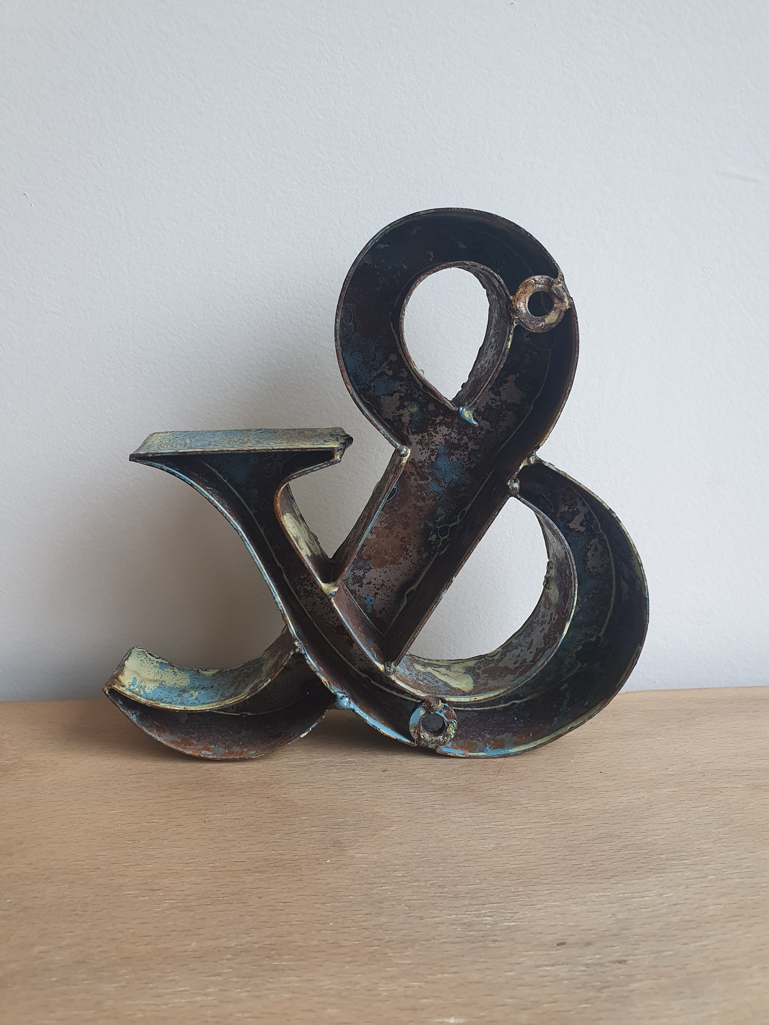 Ancient iron letter