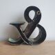 Ancient iron letter