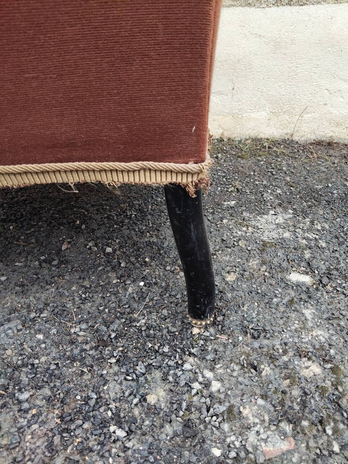 Antique brown velvet tub chair – turned legs and brass rings.