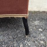 Antique brown velvet tub chair – turned legs and brass rings.