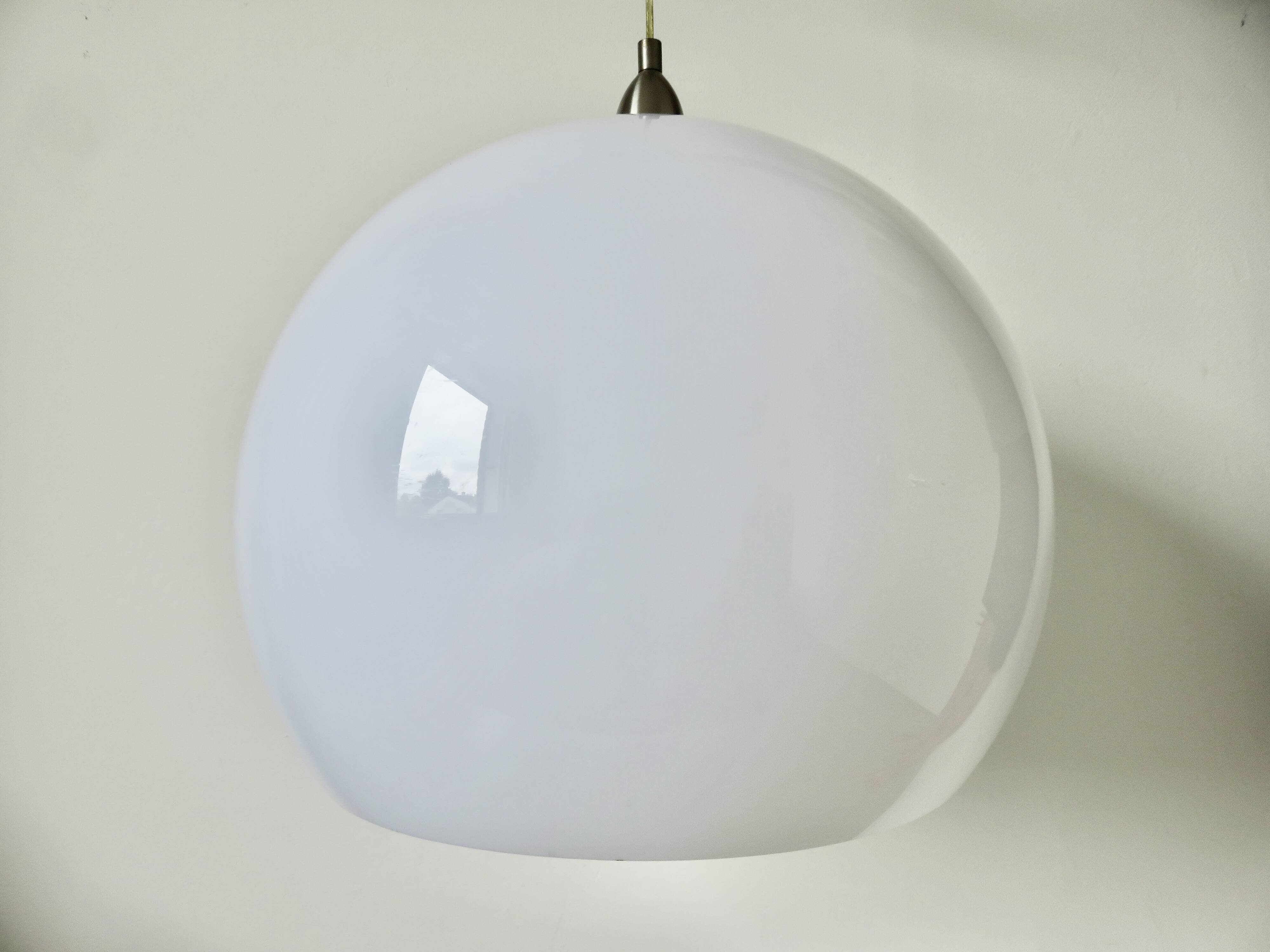 Large spherical suspension in perspex from the 1990s.