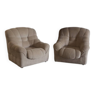 Pair of vintage sculptural armchairs in ribbed beige chenille fabric.