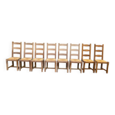 8 wooden dining chairs with straw seats, farmhouse style, high back.