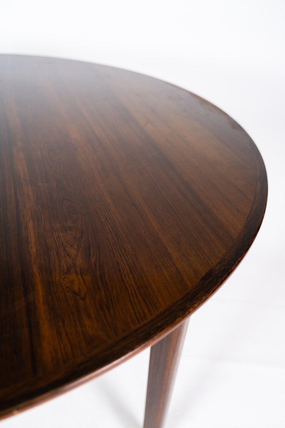 Dining table in rosewood of danish design from the 1960s.