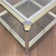 Pair of chrome, gold and silver side tables