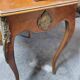Louis XV bonheur du jour in rosewood marquetry decorated with bronze.