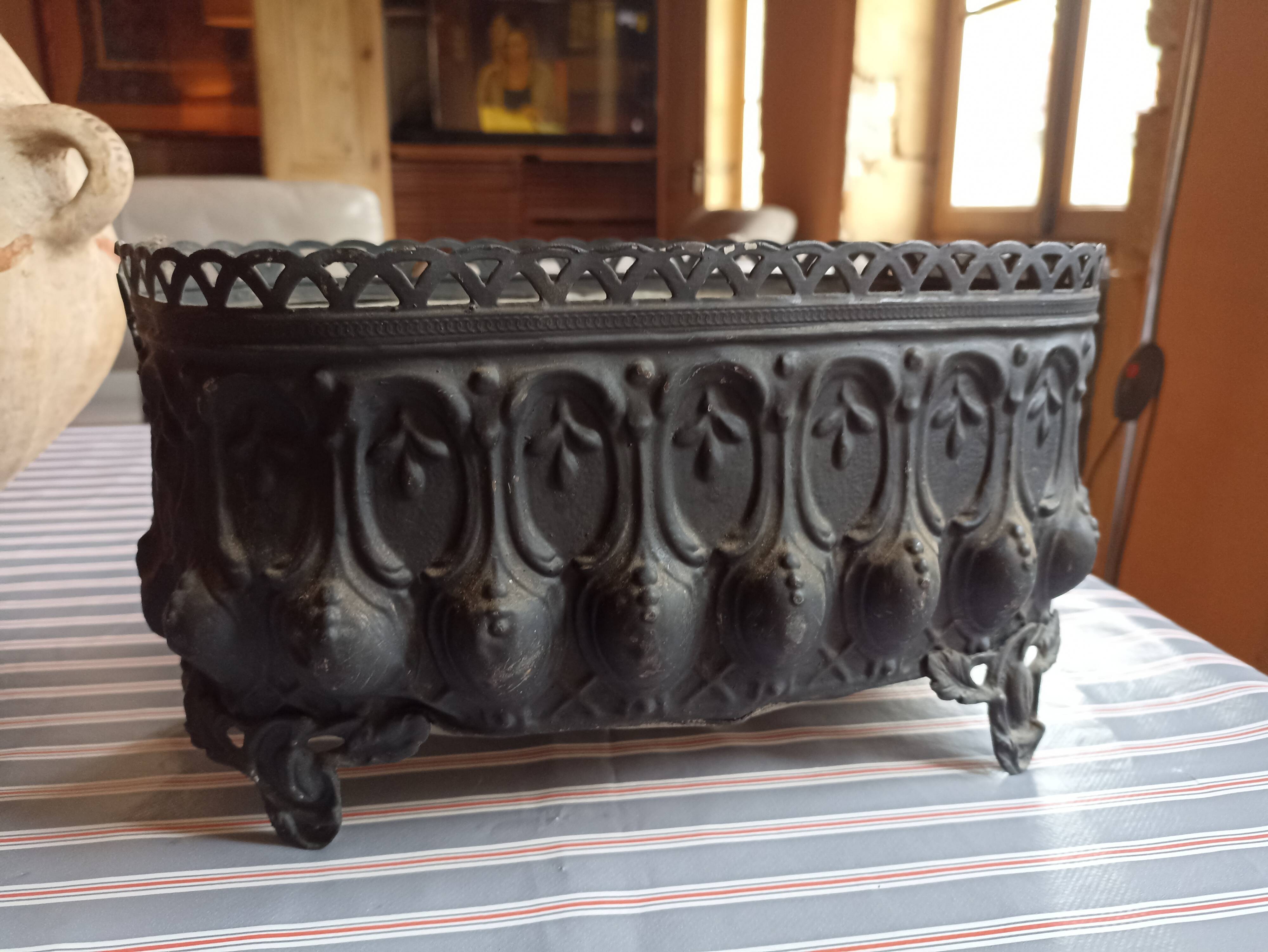 Old black iron planter