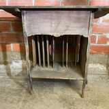 Antique writing desk, blackened wooden filing cabinet.