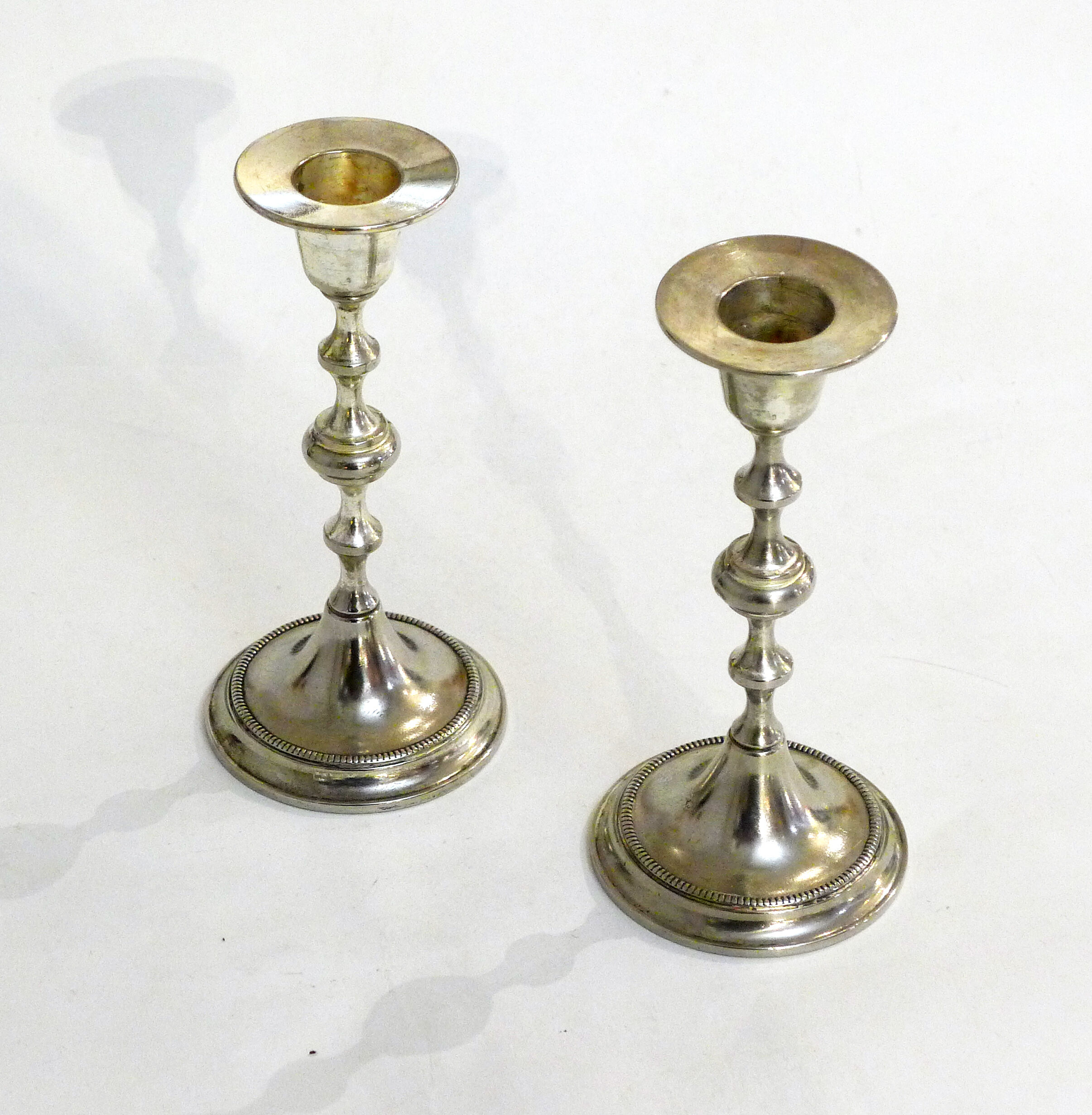Pair of metal candle holders