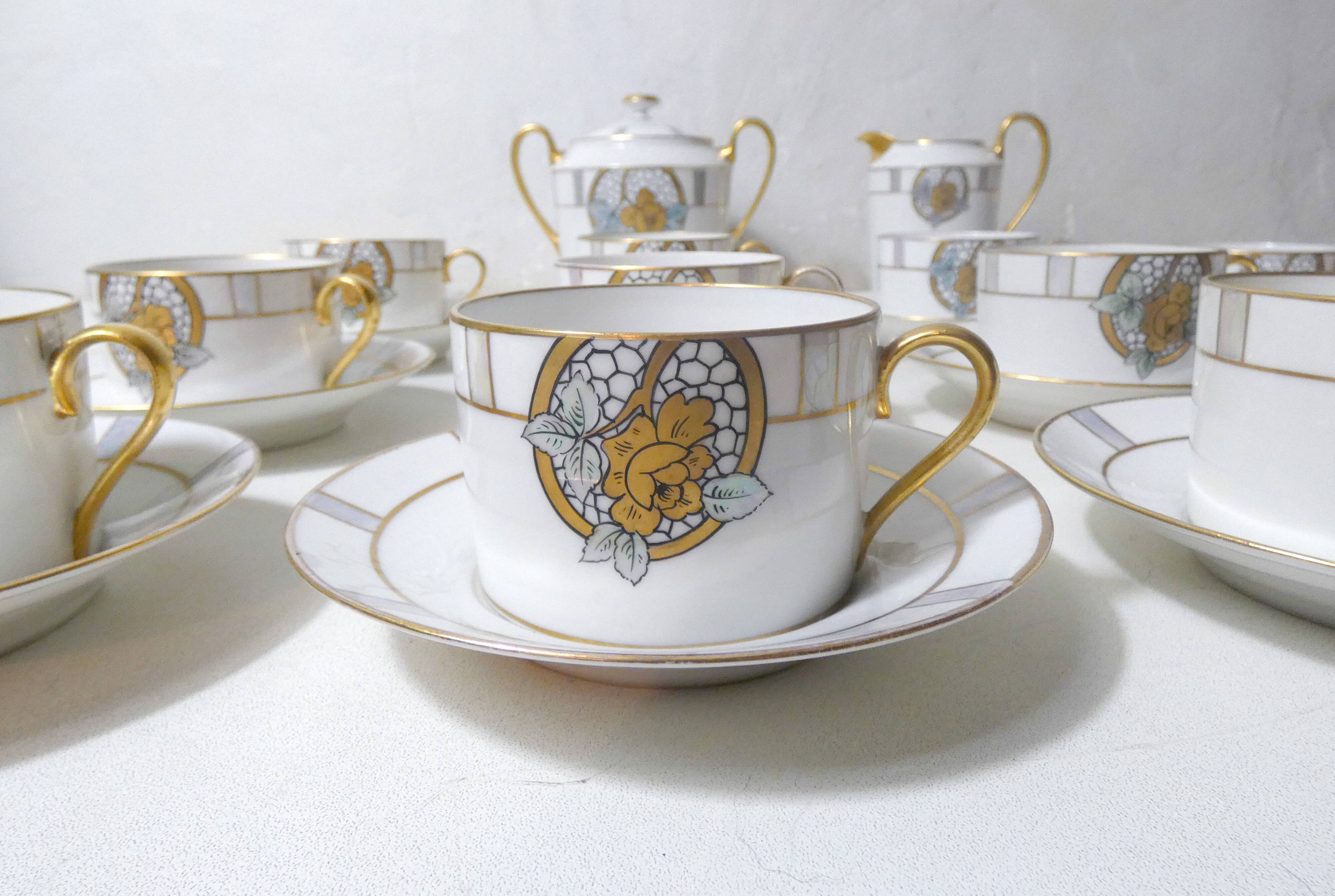 Limoges Ribes porcelain tea and coffee service, gold, silver, iridescent mother-of-pearl, Art Deco