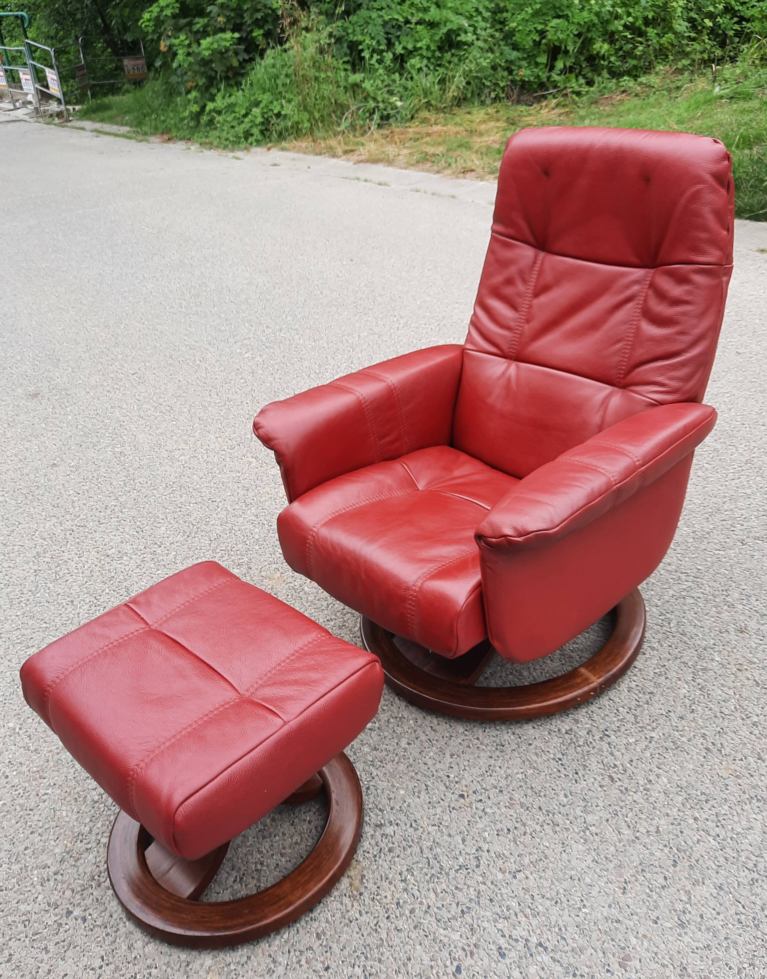 Red leather relax armchair and pouf