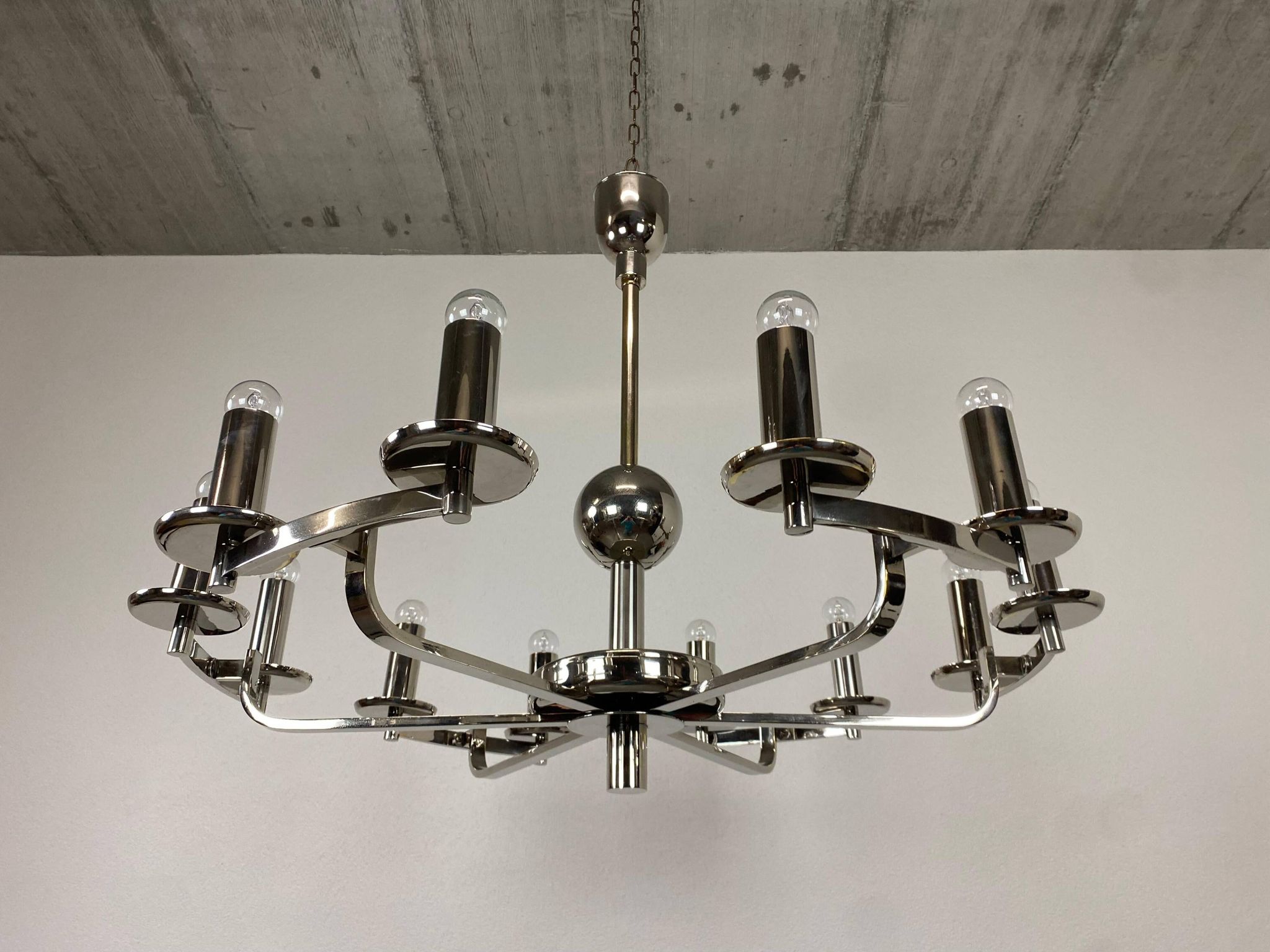 Large Bauhaus chandelier with two wall sconces.