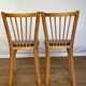 Four chairs Baumann 1960 with bars seated skaï brown label