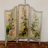 Screen has three Louis XV style panels in patinated wood XX century