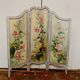 Screen has three Louis XV style panels in patinated wood XX century