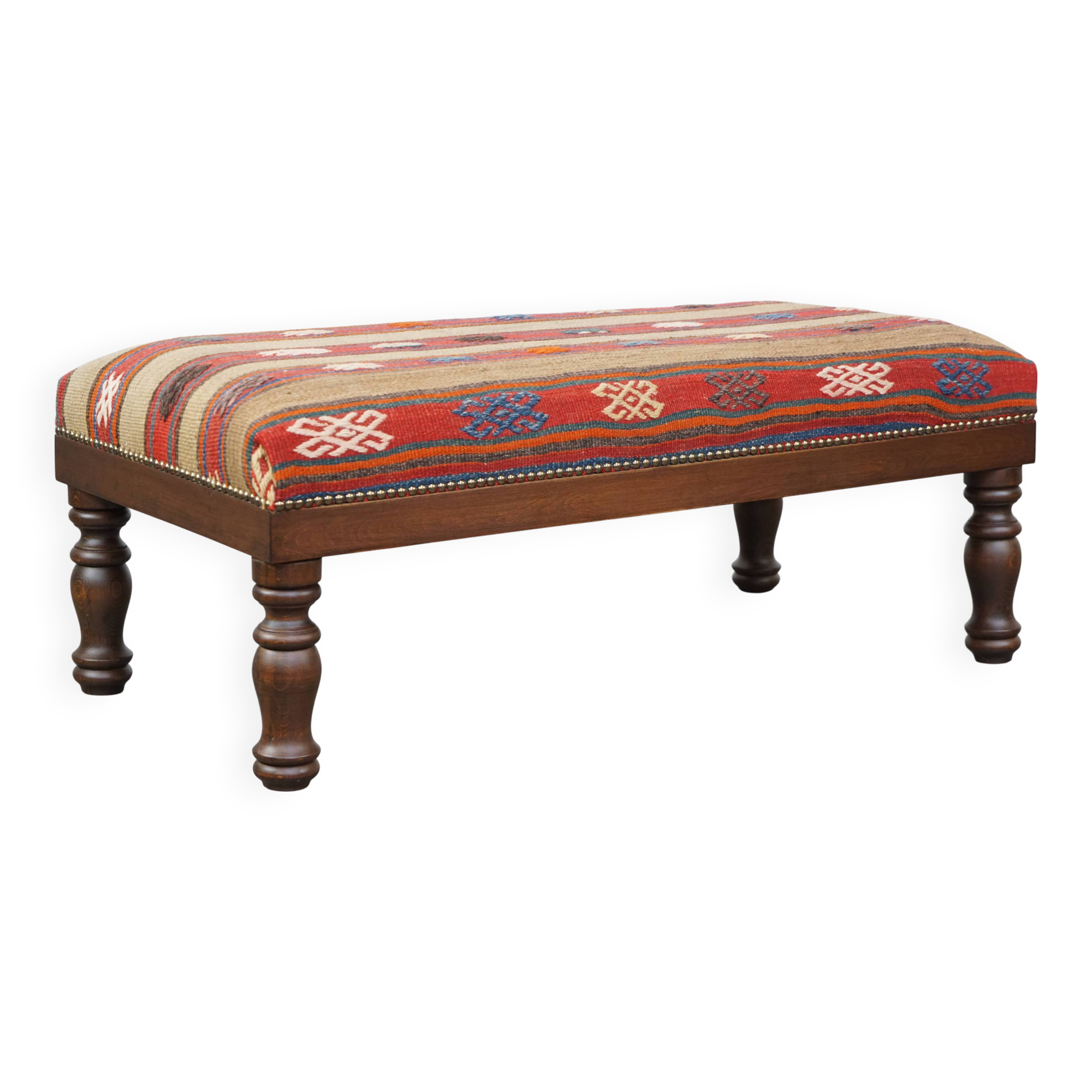 Oriental pouf upholstered in an antique kilim