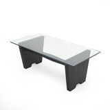 Coffee table with a glass top and black stained wood frame, 1930s.