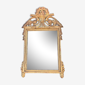 Antique mirror with gilded wood pediment, Louis XVI style