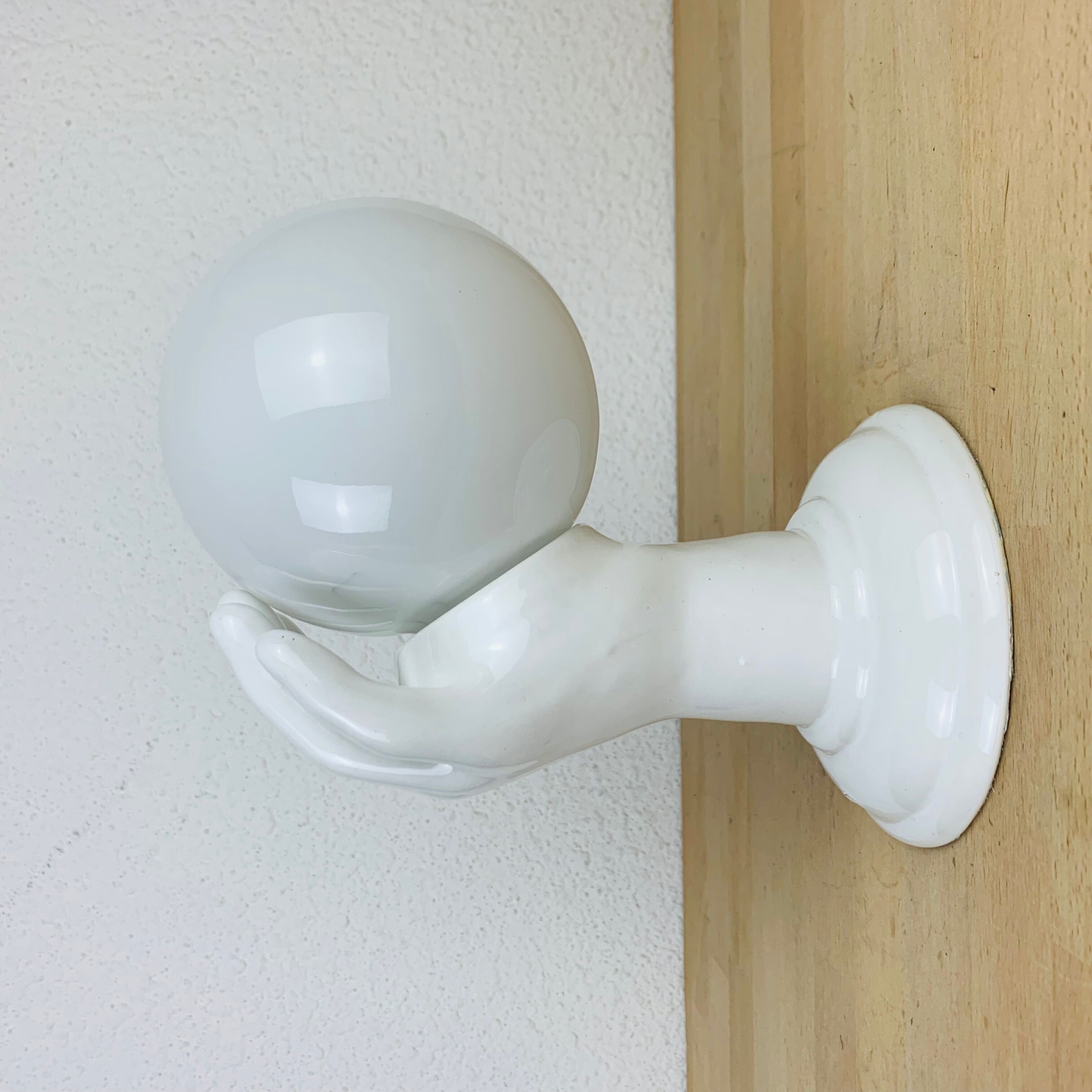 White and opaline ceramic hand wall lamp