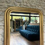 Antique mirror 136.5/98cm Louis-Philippe pearl-gilded with gold leaf.