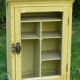 Former toilet cabinet screened door