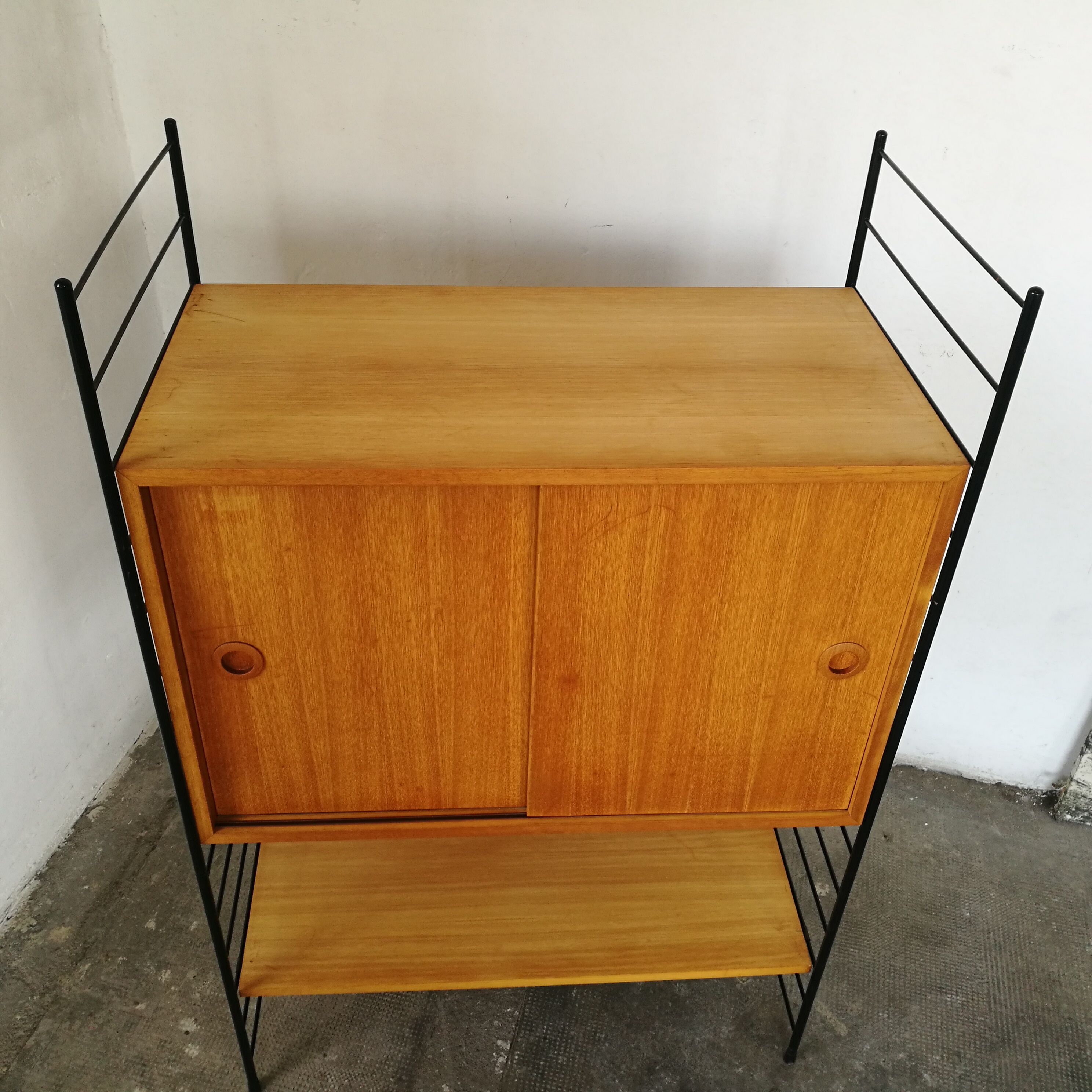 Scandinavian modular shelf with string scale
