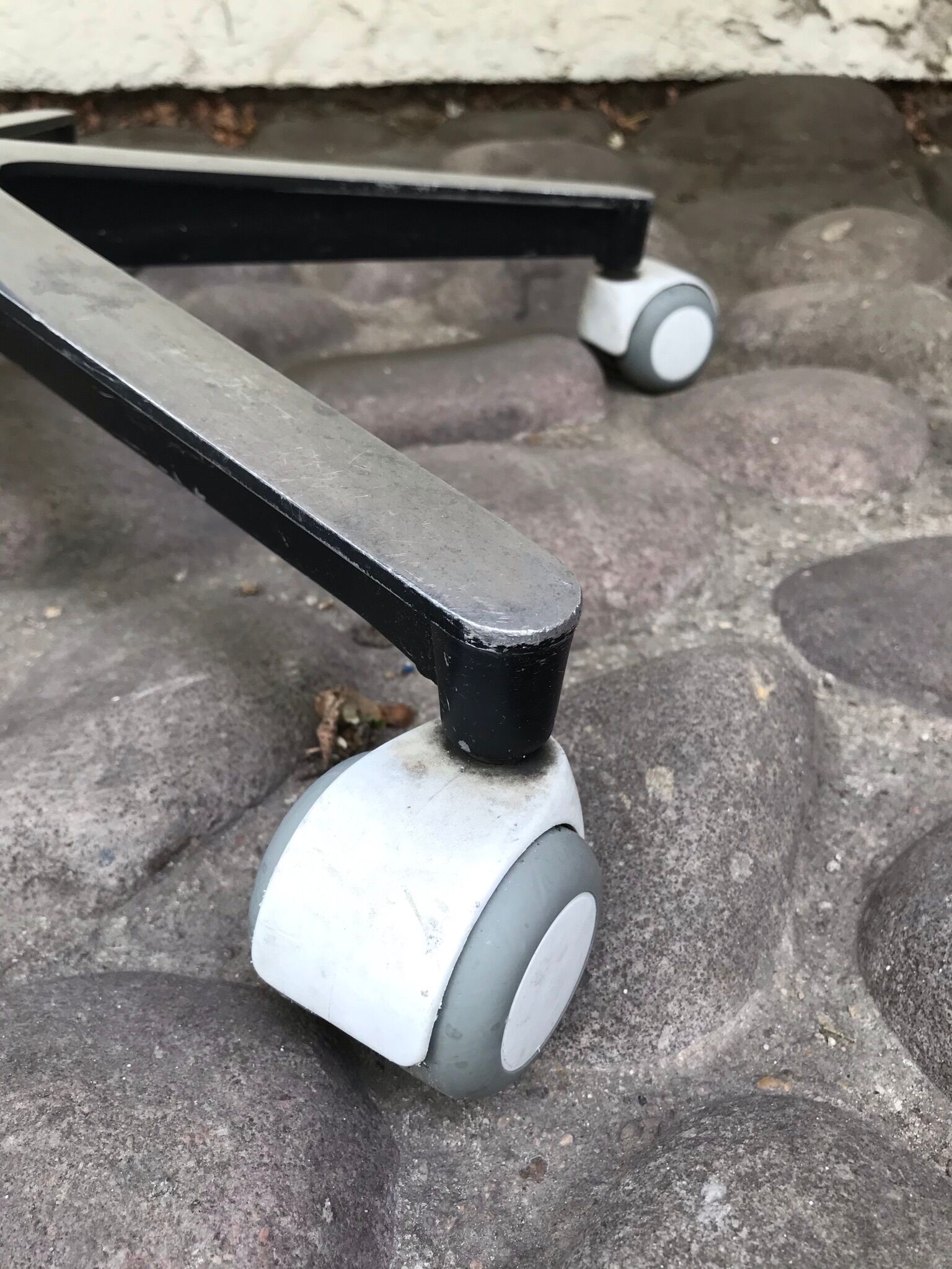 Stool on metal stand in star on wheels sitting round padded skaï bluish