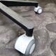Stool on metal stand in star on wheels sitting round padded skaï bluish