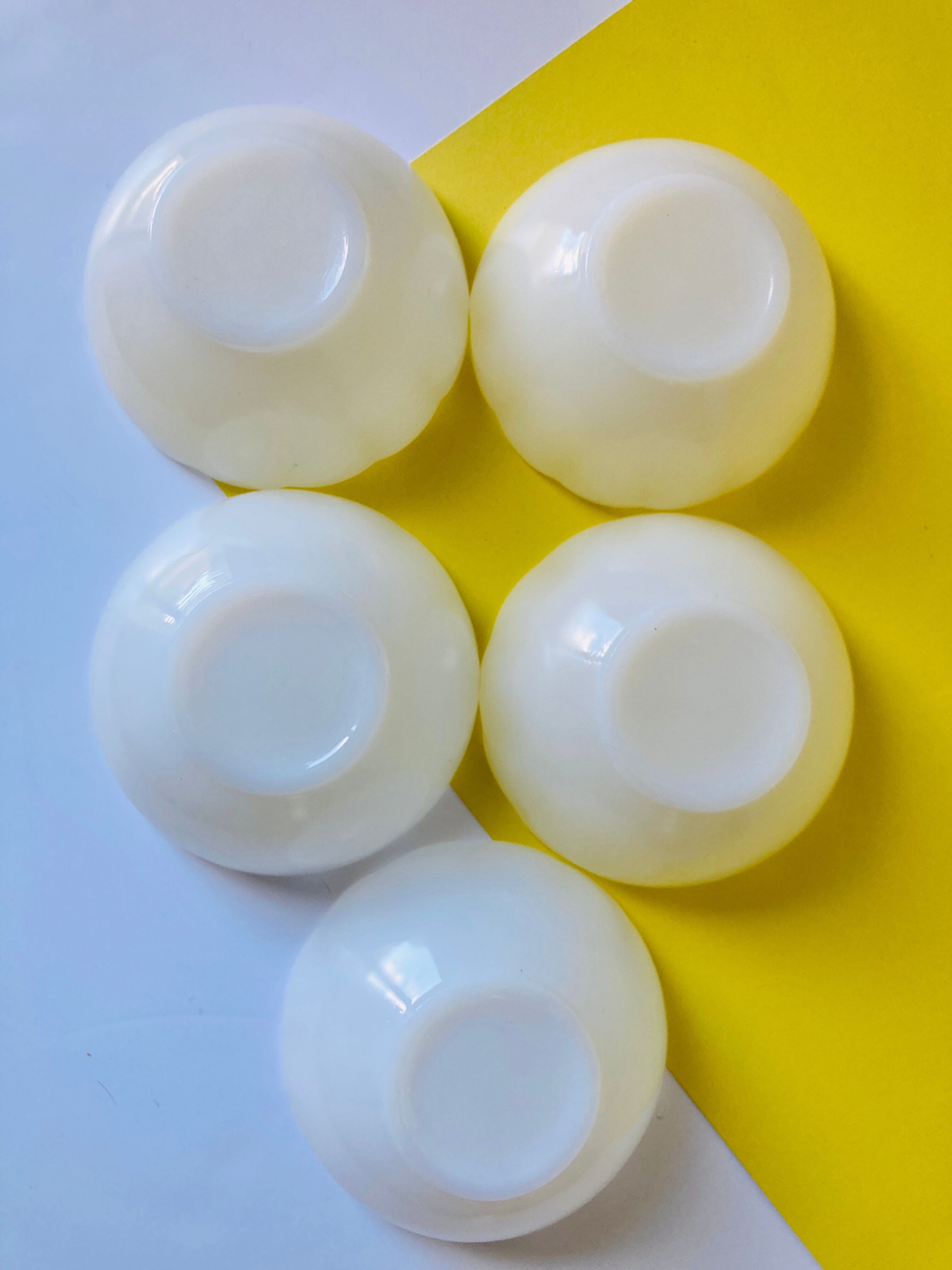 5 bowls in white glass