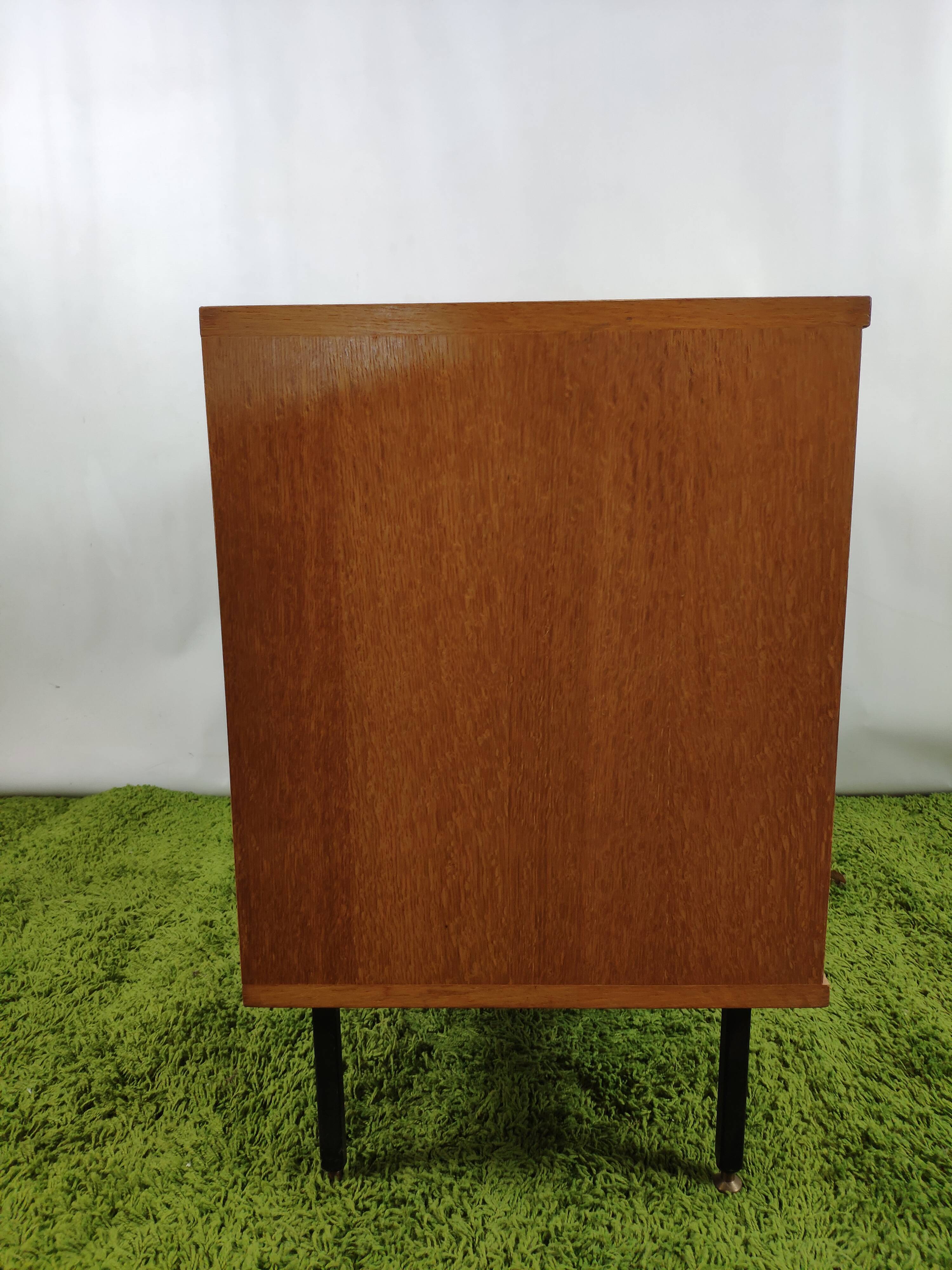Wooden chest of drawers with gilded handle