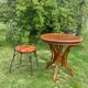 Round table and wrought iron chair