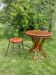 Round table and wrought iron chair