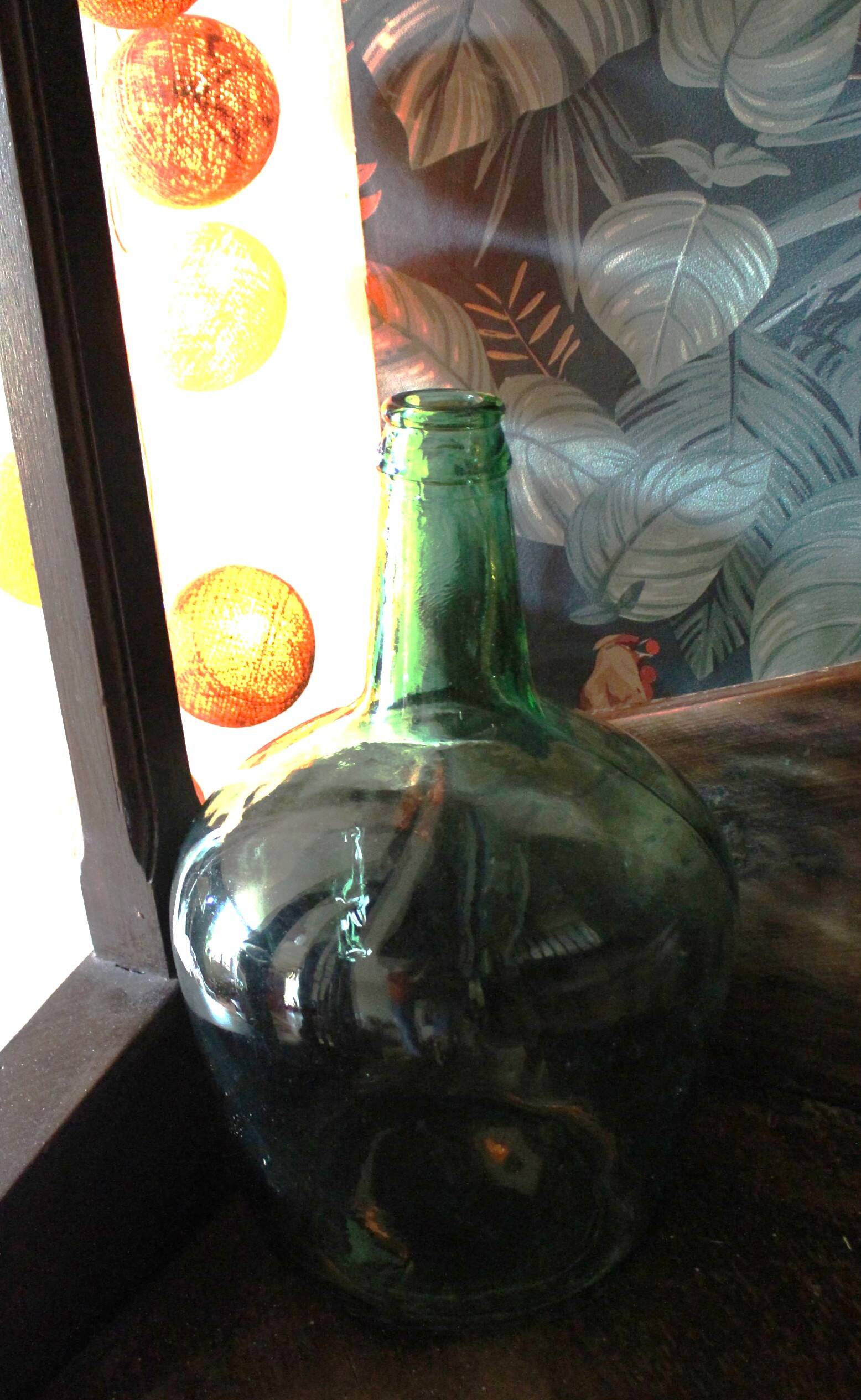 Give me a dark green glass Bonbonne jar.