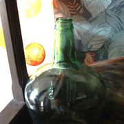 Give me a dark green glass Bonbonne jar.
