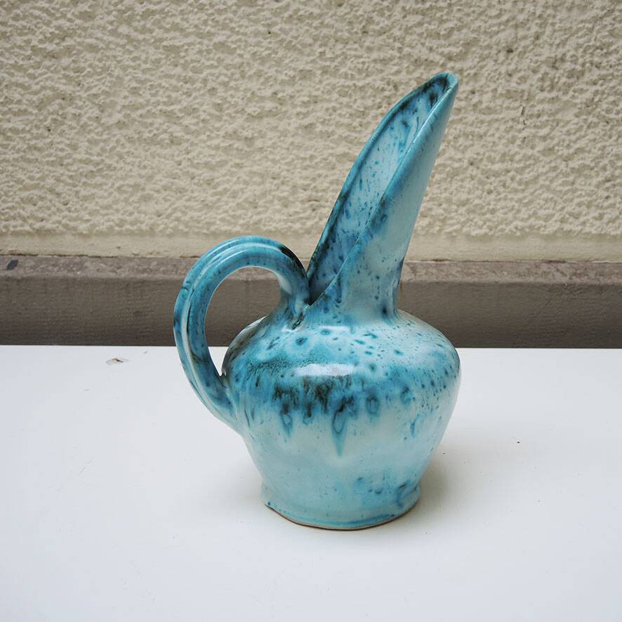 Old 'long spout' turquoise ceramic jug