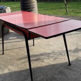 Red formica table with extensions