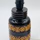 Vintage ceramic lamp with relief and wool shade.