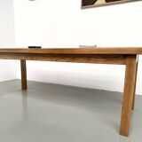 Solid oak farmhouse table, square legs.