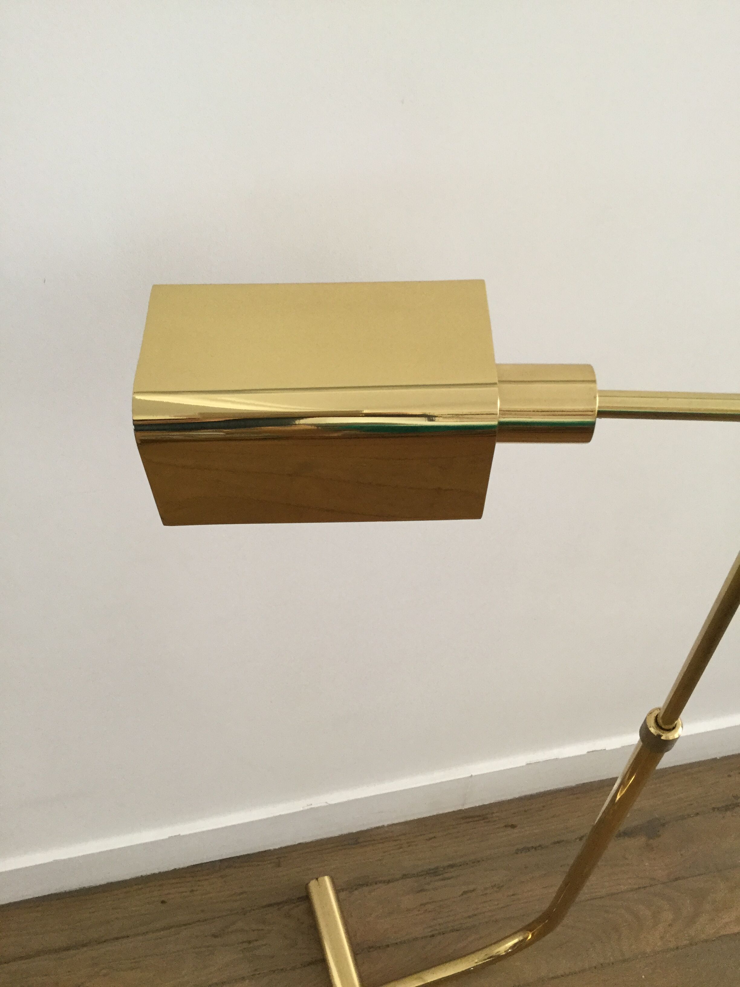 Golden brass e-reader by christian liaigre 80's