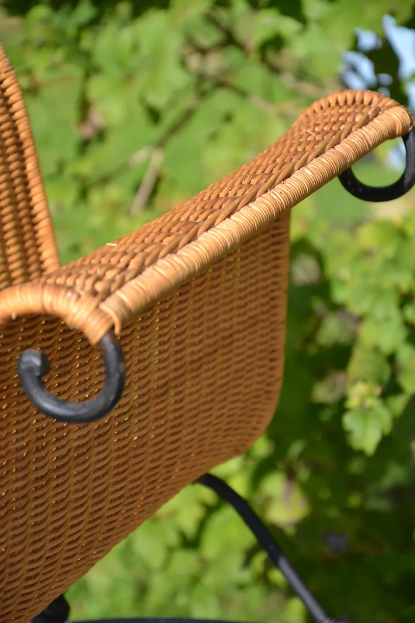Wrought iron and rattan magazine/newspaper rack