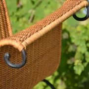 Wrought iron and rattan magazine/newspaper rack