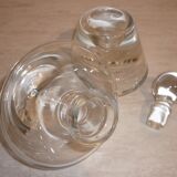 Wine decanter with cork on crystal base