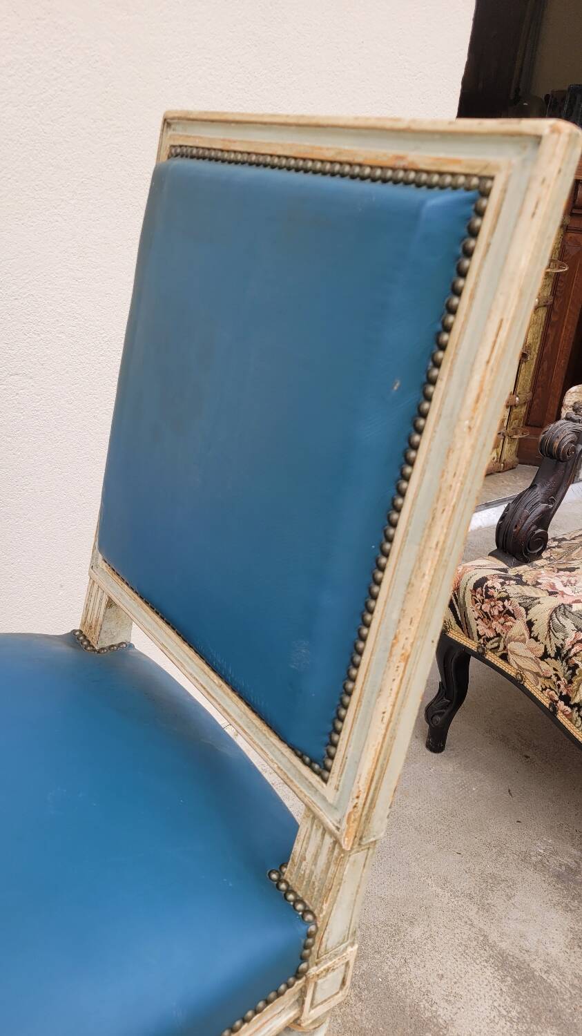 Pair of antique Louis XVI style chairs with patina