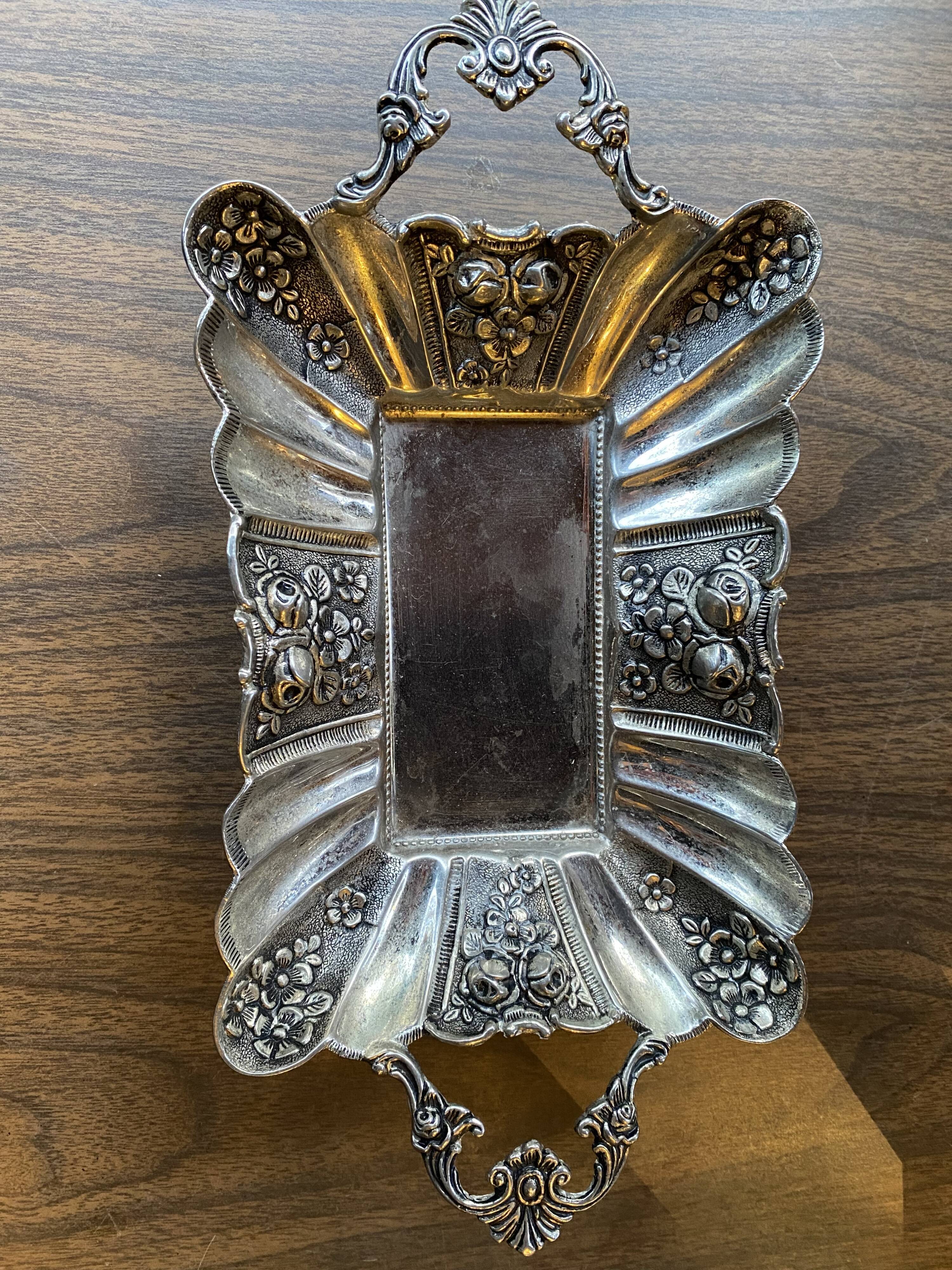 Empty pocket in silver metal