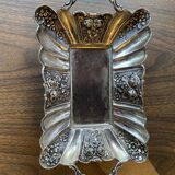 Empty pocket in silver metal
