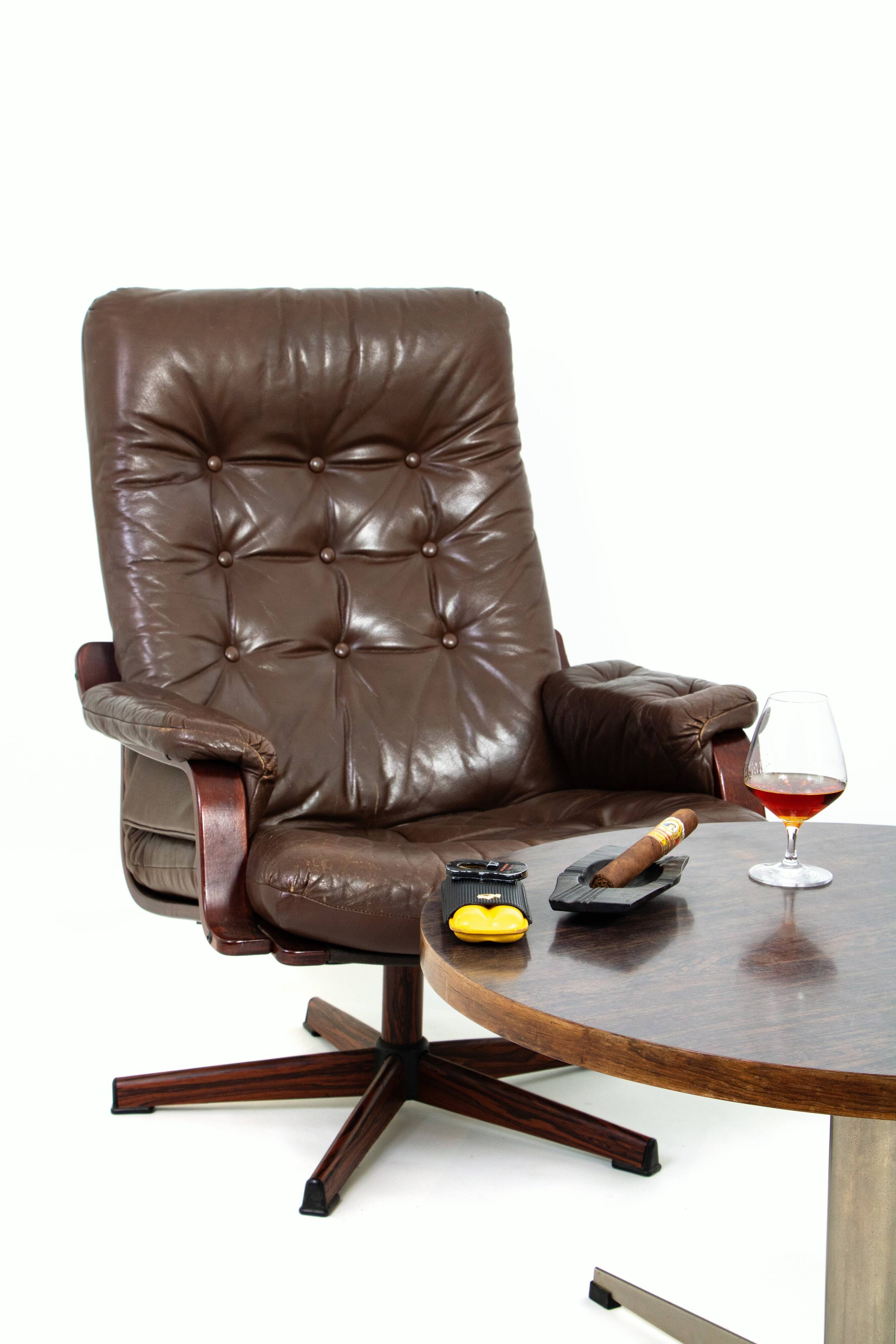 Pair of 2 Swedish swivel leather chairs