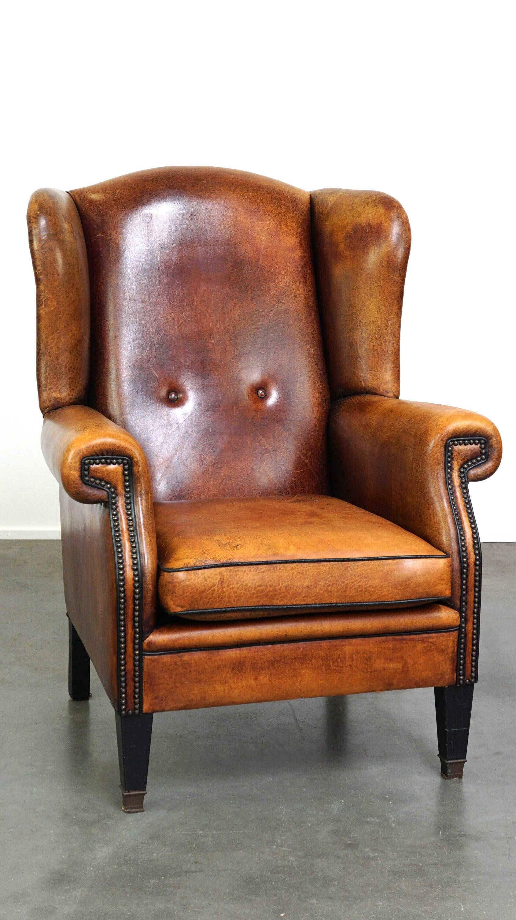 Sheepskin leather chair with a beautiful patina