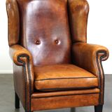 Sheepskin leather chair with a beautiful patina